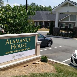 Entrance and sign for Alamance House, an assisted living facility.