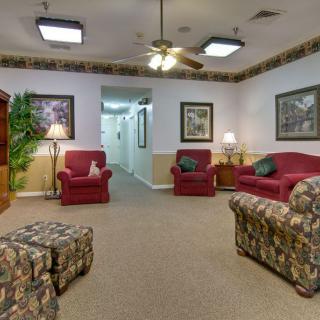 A cozy living room with comfortable seating and warm decor.