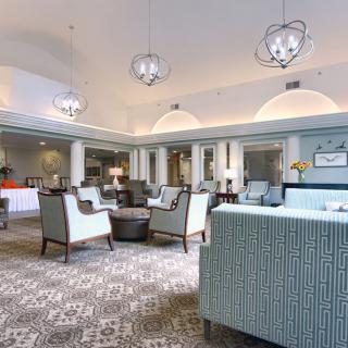 A modern lobby with comfortable seating and elegant lighting.