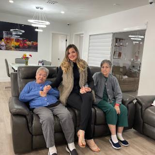A joyful moment shared among family, relaxing on the sofa.