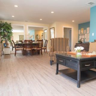 A modern living room with a dining area blending elegance and comfort.