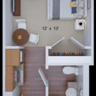 A compact apartment floor plan featuring a bedroom, kitchen, and bathroom.