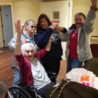 A joyful gathering of friends celebrating together.