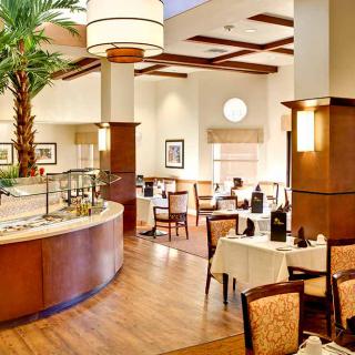 A stylish restaurant dining area with elegant decor and comfortable seating.