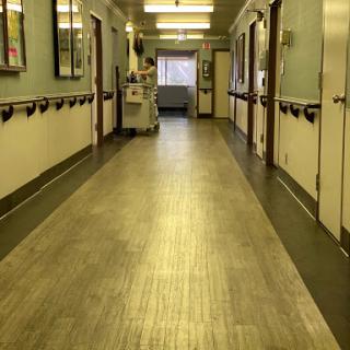 A view of a hospital corridor, showcasing the healthcare environment.