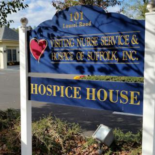 Sign for the hospice house and nursing service, providing supportive care.