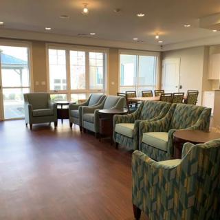 A bright waiting room with comfortable seating and ample natural light.