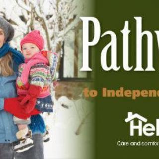 A mother and child enjoy a snowy day, featured in an advertisement for a company focused on pathways to independence.
