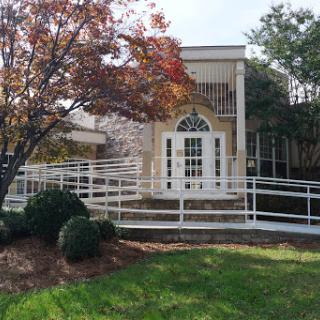 A well-designed accessible entrance with a beautiful surrounding landscape.