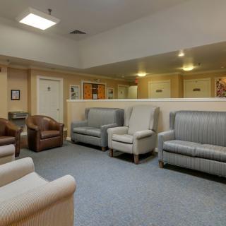 A spacious waiting room with comfortable seating arrangements.