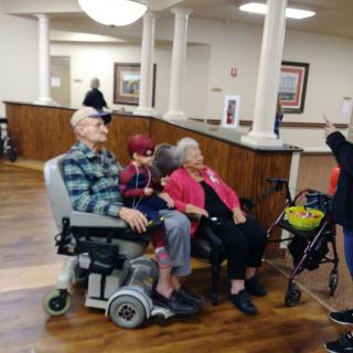 A family spending time together in a healthcare facility.