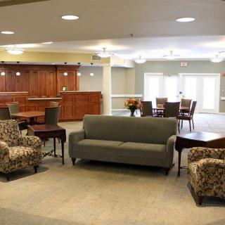 Spacious lounge area with comfortable seating and warm lighting.
