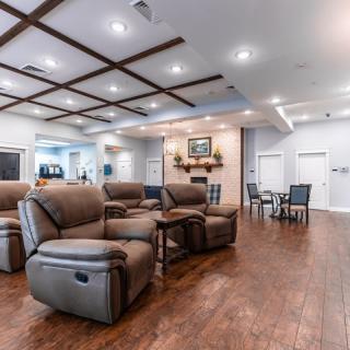 A modern living room with comfortable recliner chairs and stylish decor.