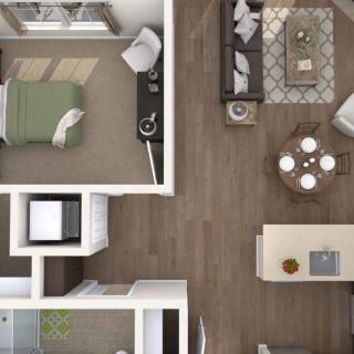 A top-down view of a modern apartment floor plan, showcasing the layout with a living room and bedroom.