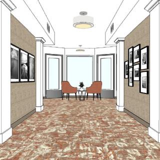A modern hallway design with artwork on the walls and a cozy seating area at the end.