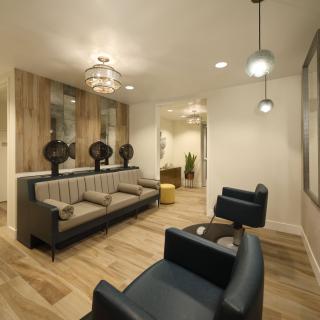 A modern lobby with stylish seating and elegant lighting fixtures.