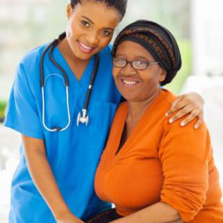 A nurse and a patient smiling together, showcasing medical care and support.