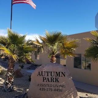 Welcome to Autumn Park Assisted Living, surrounded by palm trees and featuring a clear blue sky.