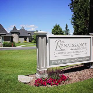 Entrance sign of The Renaissance at Coeur d'Alene showcasing a landscaped property.