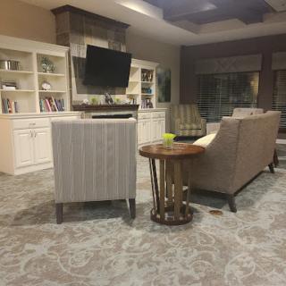 A cozy and modern living room featuring a comfortable sofa, TV setup, and stylish decor.