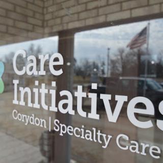 Exterior view of Care Initiatives facility sign in Corydon.