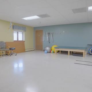 A well-equipped therapy room designed for rehabilitation and physical therapy.