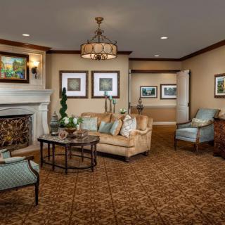 A cozy living room with elegant furniture and a warm ambiance.