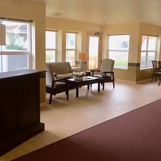 A bright and inviting lobby with comfortable seating and abundant natural light.