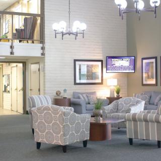 A modern lobby with comfortable seating and stylish decor.
