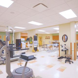 A well-equipped rehabilitation center with various exercise and therapy equipment.