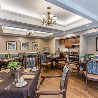 A well-appointed dining area with elegant furnishings and a cozy atmosphere.