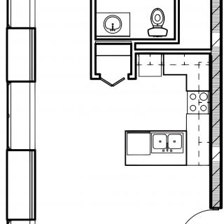 A floor plan showing a bathroom and a kitchen layout.