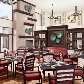 A beautifully designed modern restaurant interior featuring elegant furniture and artistic decor.