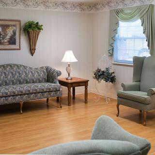 A cozy living room with elegant furniture and soft lighting.