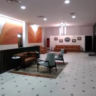 A modern lobby with comfortable seating and stylish lighting.