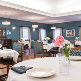 An elegant dining room featuring tasteful decor and inviting atmosphere.