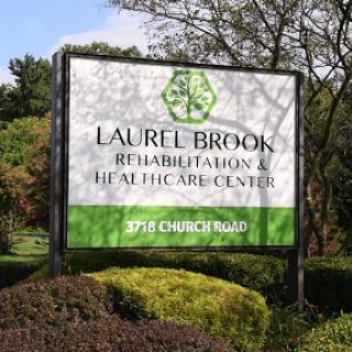 Sign for Laurel Brook Rehabilitation & Healthcare Center.