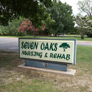 Sign for Seven Oaks Nursing & Rehab, indicating a healthcare facility.