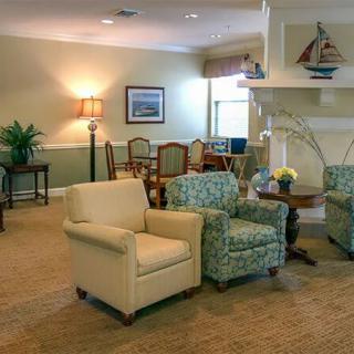 A cozy living room with comfortable seating and decor.