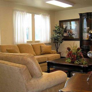 A cozy living room with comfortable sofas and a stylish coffee table.