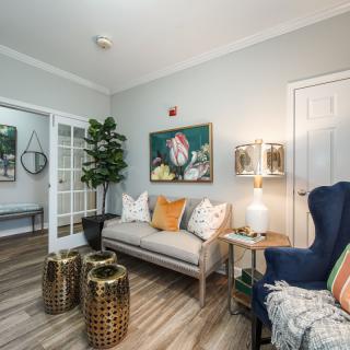 A cozy, modern living room with stylish furniture and decor.