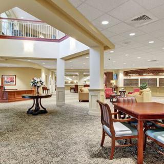 A spacious lobby area with elegant furniture and decor.