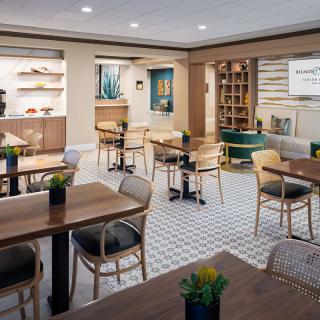 A modern dining area with contemporary furniture and stylish decor.