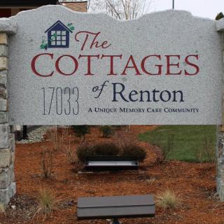 Sign for The Cottages of Renton, a memory care community.