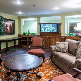 A cozy living room with comfortable seating and tasteful decor.