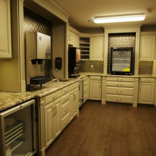 A well-designed modern kitchen featuring stylish cabinetry and appliances.
