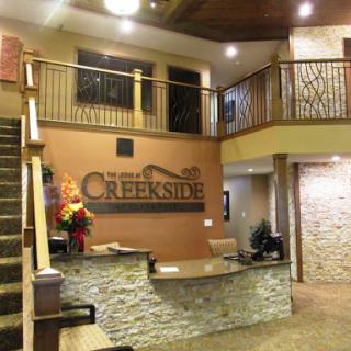 A welcoming lobby of Creekstone Hotel featuring modern design elements.