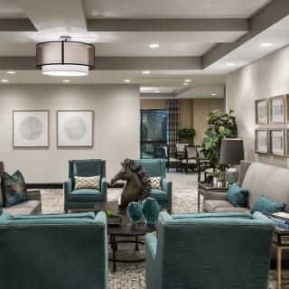 A stylish and comfortable living room with modern furniture and decor.