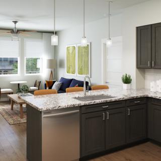 Open concept modern kitchen and living room with stylish decor.