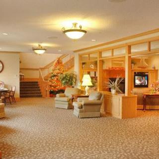 A warm and inviting hotel lobby with comfortable seating and elegant lighting.